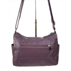 На фото 2 - Женская сумка из искусственной кожи цвет фиолетовый