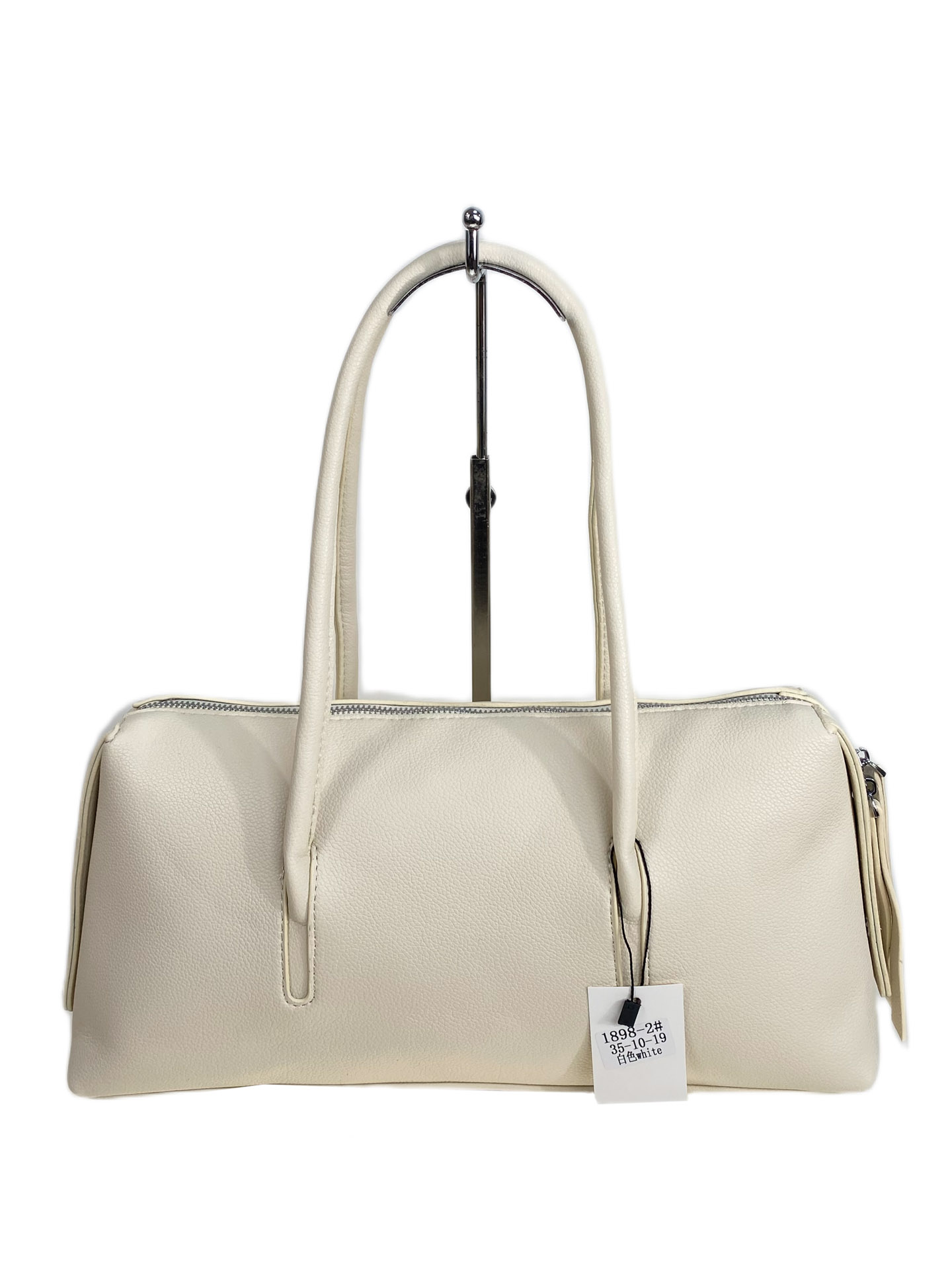 На фото 1 - Женская сумка из искусственной кожи, цвет белый