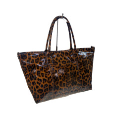 На фото 1 - Женская сумка из натуральной кожи, цвет леопард