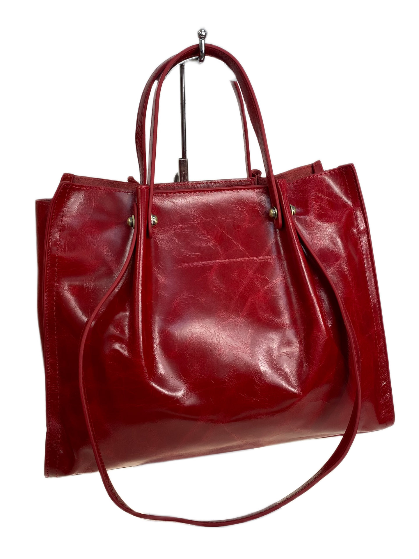 На фото 1 - Женская сумка из натуральной кожи, цвет красный