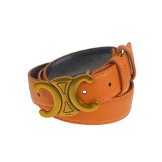 На фото 1 - Ремень женский из искусственной кожи , цвет  оранжевый На фото 1 - Ремень женский из искусственной кожи , цвет  оранжевый