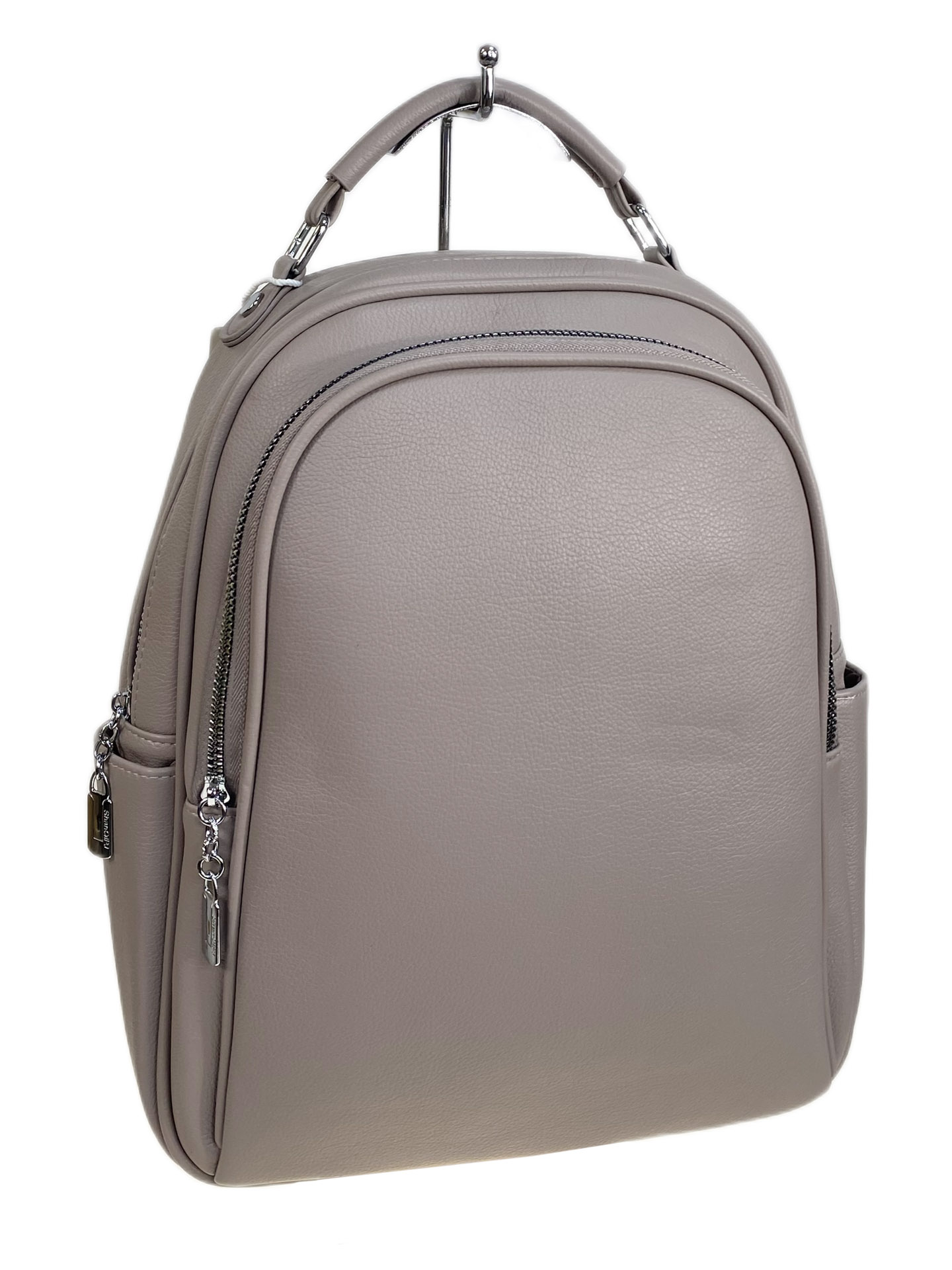 На фото 1 - Женский рюкзак из искусственной кожи, цвет светло серый